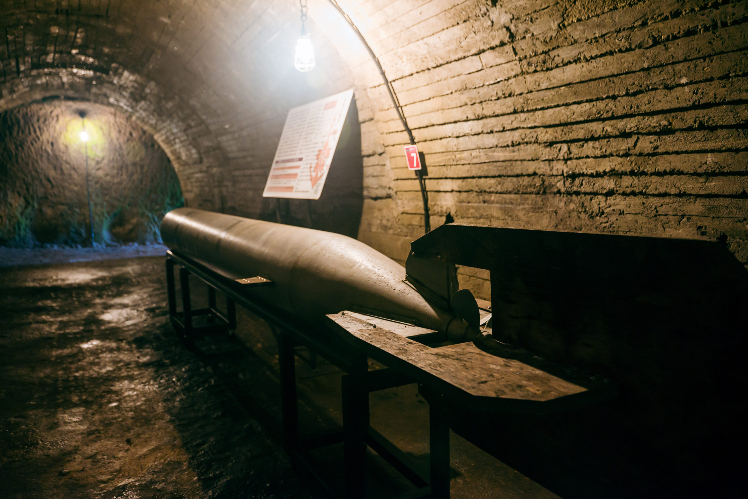 A life-size replica of a torpedo in underground tunnel of Nishiki Secret Base Museum